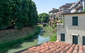 Welc-oM Savonarola river view